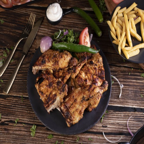 دجاجة  مشوية علي الفحم